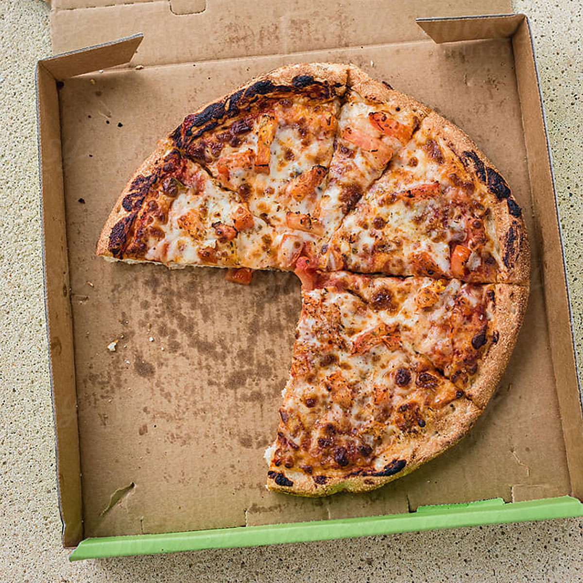 Round Pizza in a square box